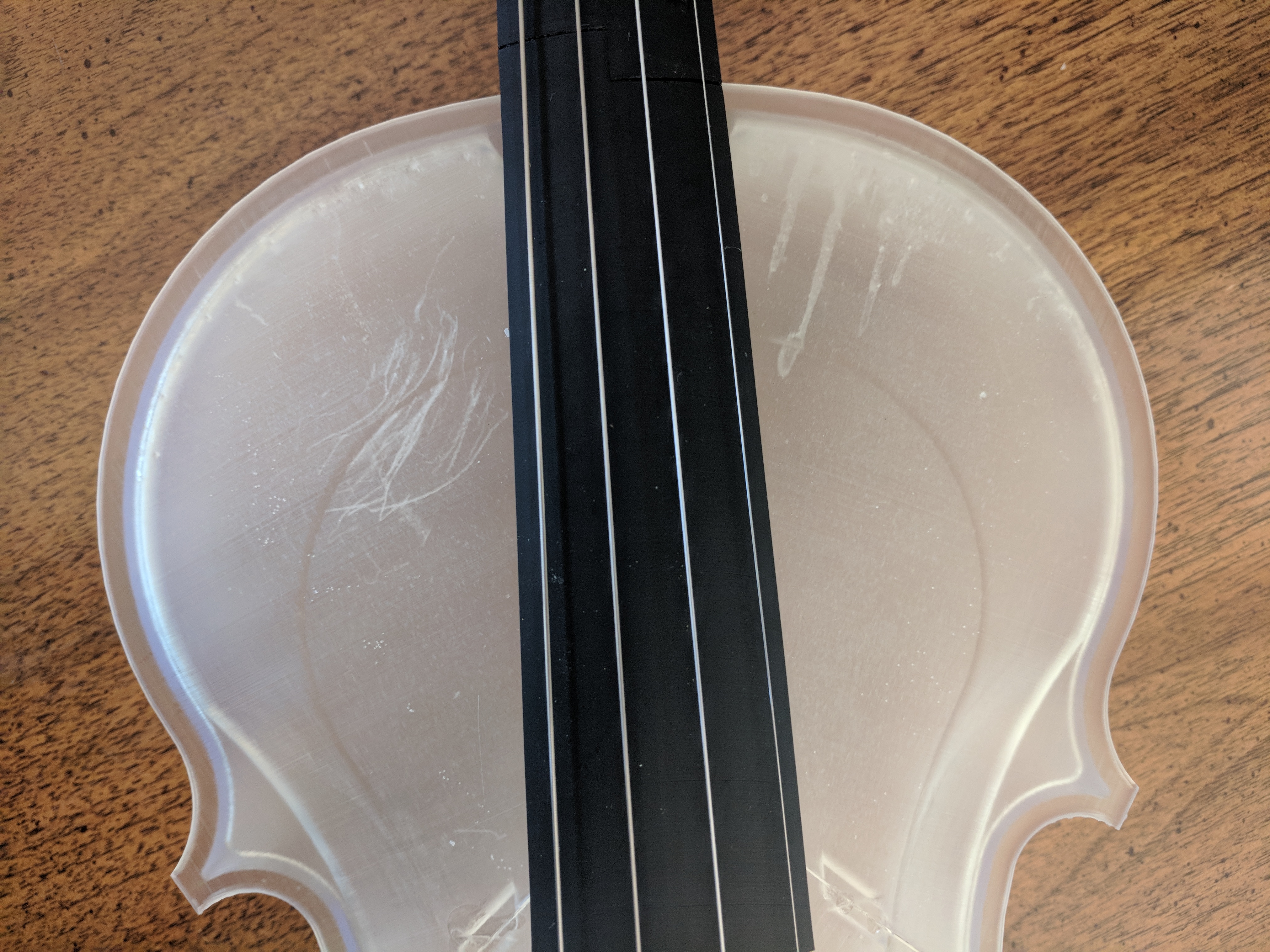 scratches on violin body